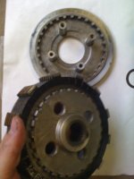 separating center pressure plate and old discs.JPG