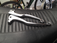 Milled and drilled levers