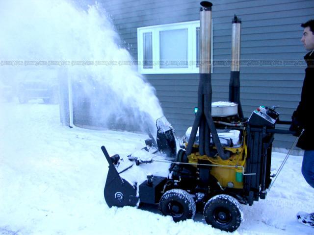 V8%20snow%20blower%20in%20use.jpeg