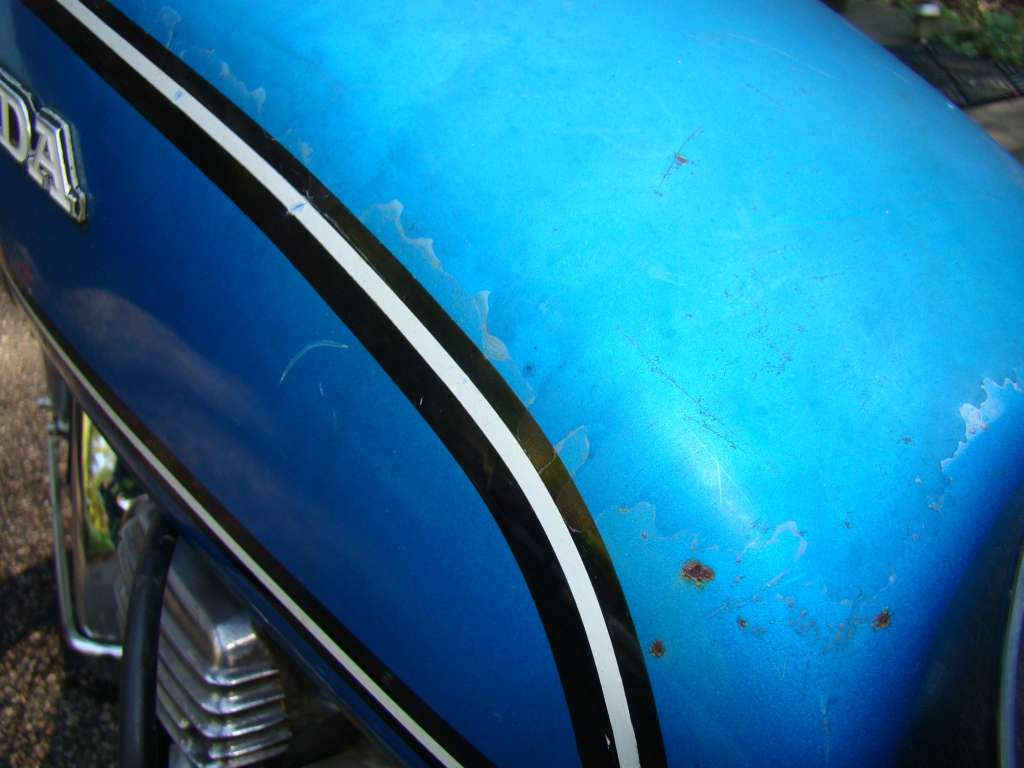 oldtankpaintdamage.jpg